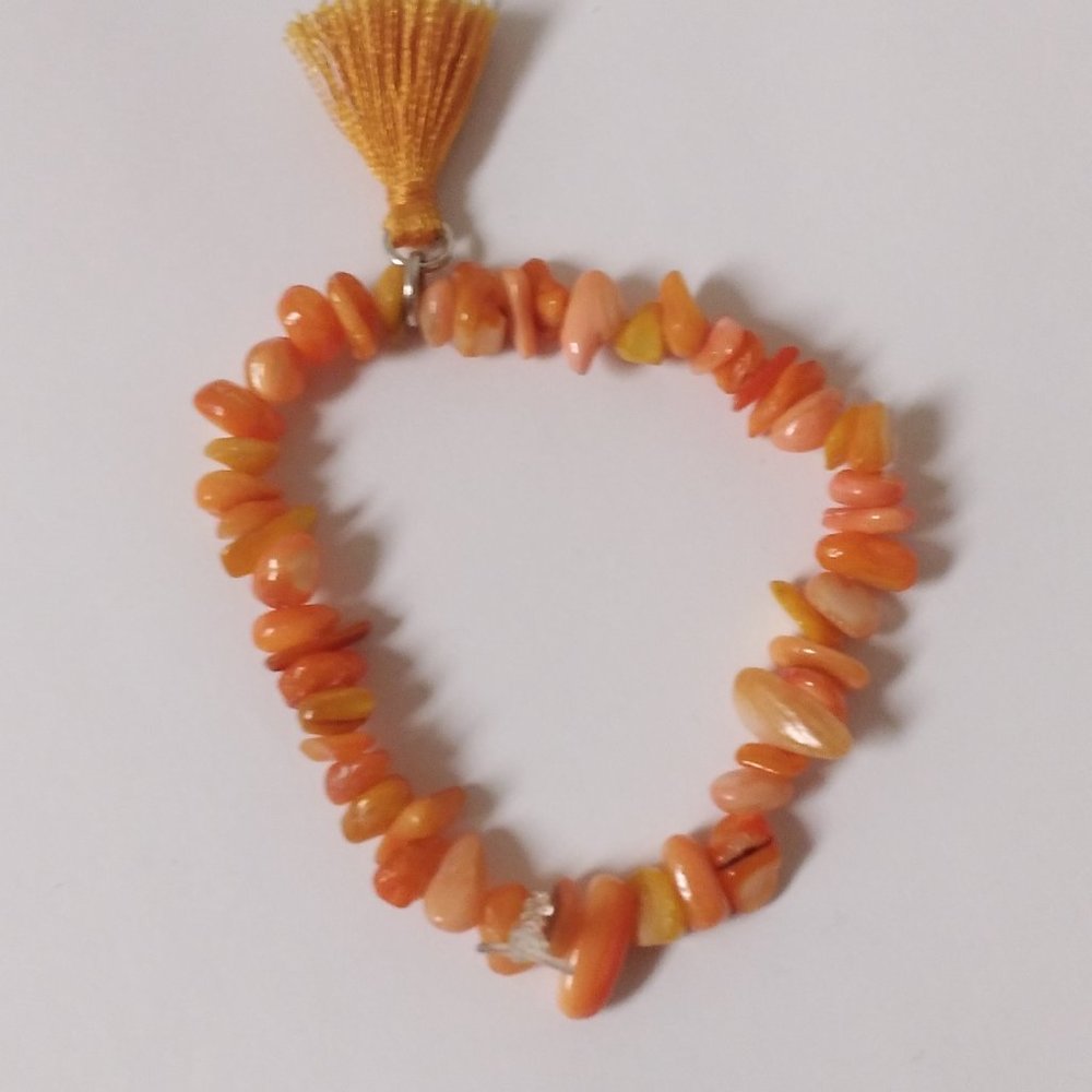 yellow orange, orange, and orange tassel homemade bracelet💛🧡